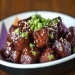 Melt-in-Your-Mouth Glazed Sticky Beef Bites for Dinner Delight First Image First Image
